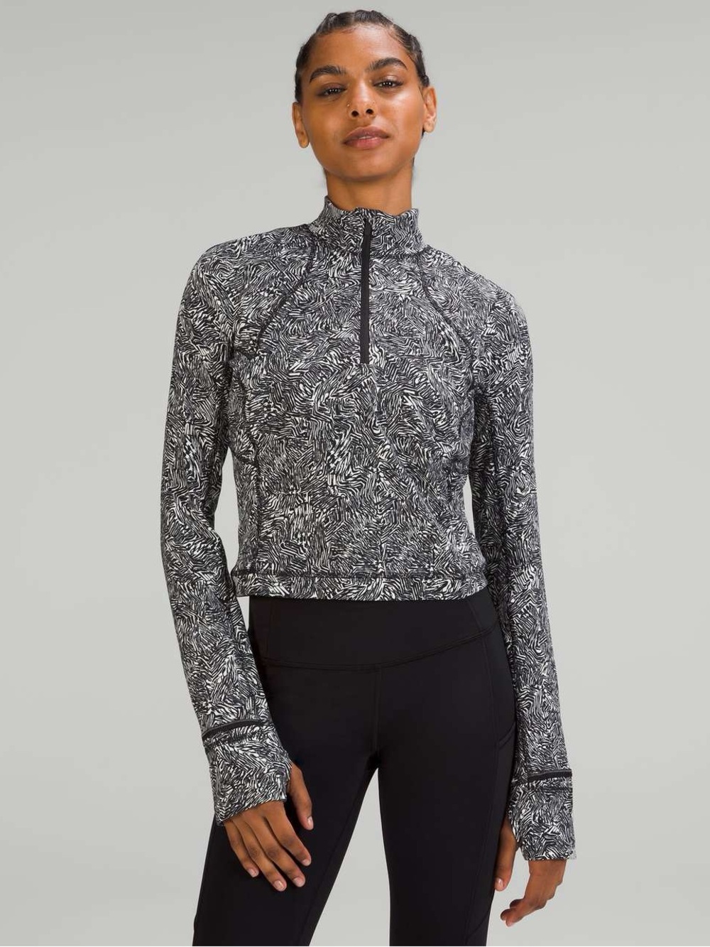 173. Lululemon Its Rulu Run Cropped Half Zip
Offbeat Alpine White Black Pullover